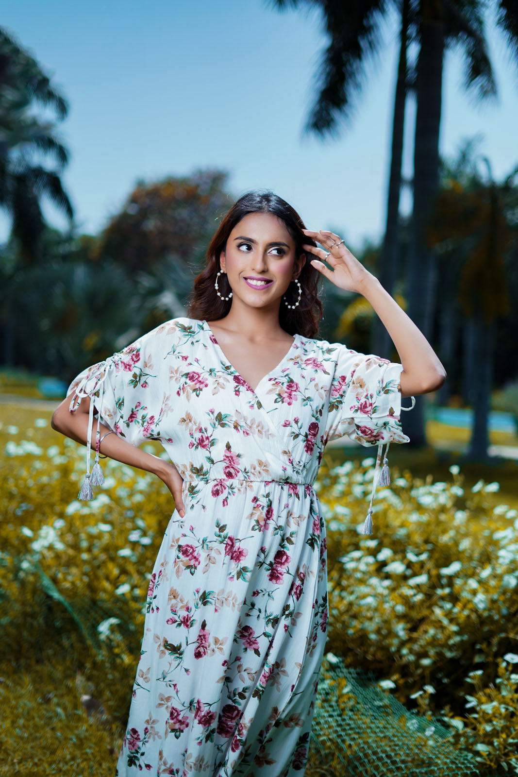 Carly White Floral Maxi Dress with Tassel Details Carly White Floral Maxi Dress with Tassel Details