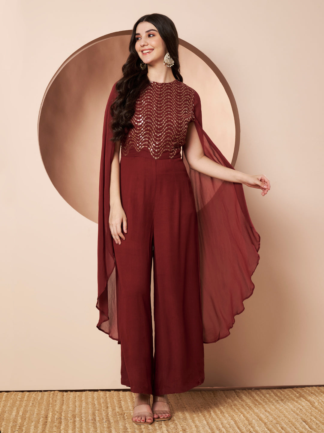 Nazuk Maroon Indo- Western Party Jumpsuit with Cape Sleeves and Gold Embroidery Details for Cocktail