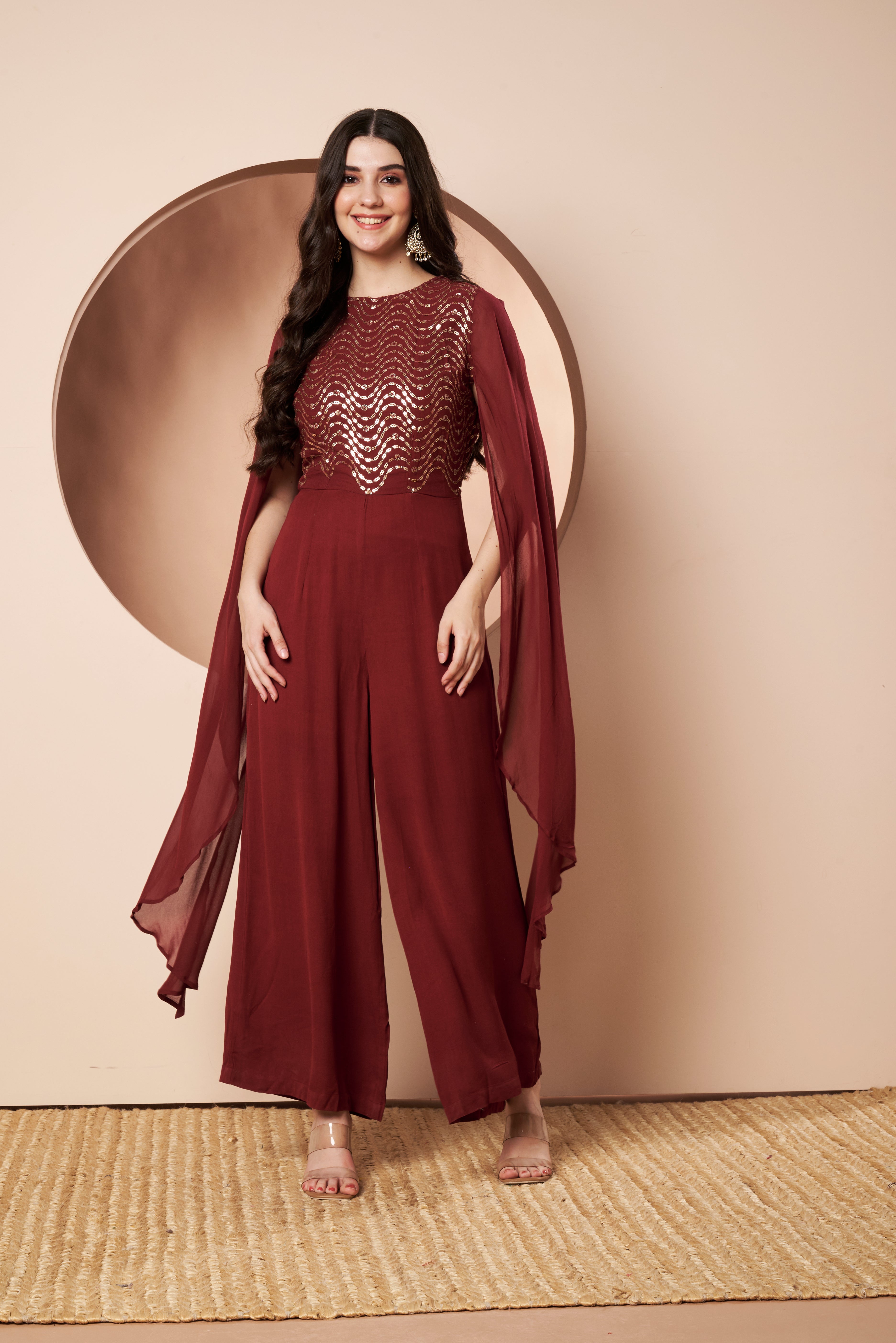 Nazuk Maroon Indo- Western Party Jumpsuit with Cape Sleeves and Gold Embroidery Details for Cocktail